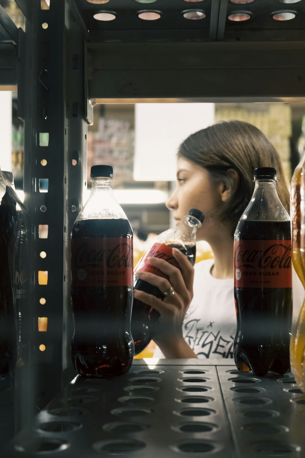 a person drinking from a glass