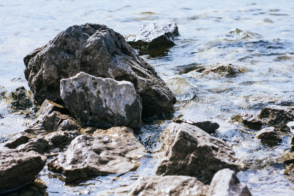 a rocky beach with waves crashing