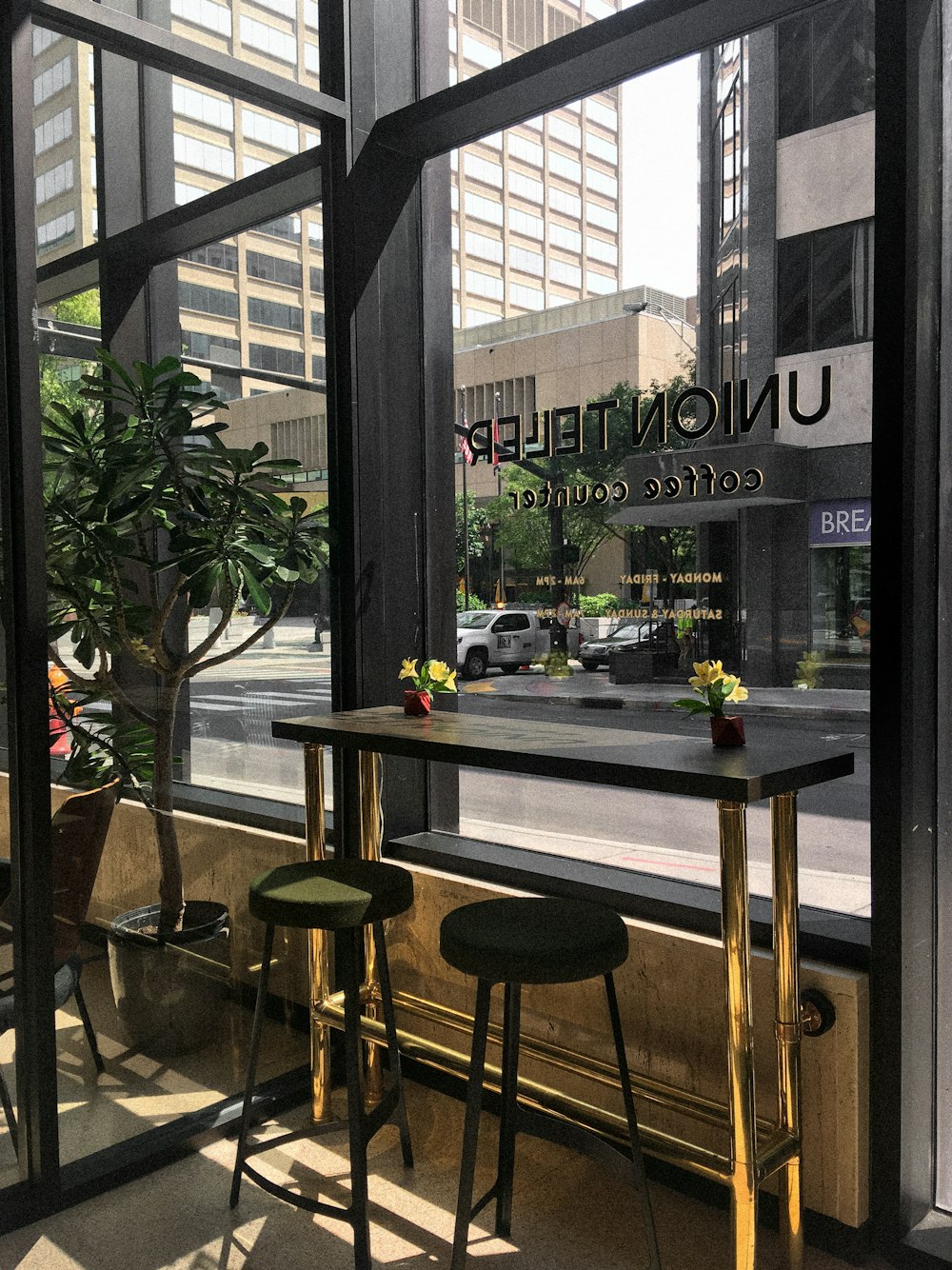 a table and chairs outside a building