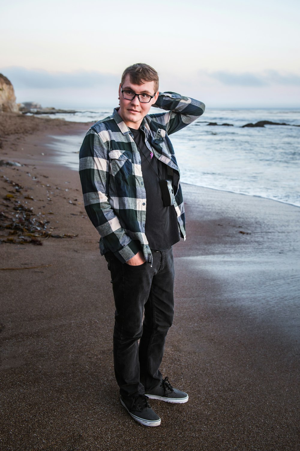 a man standing on a beach