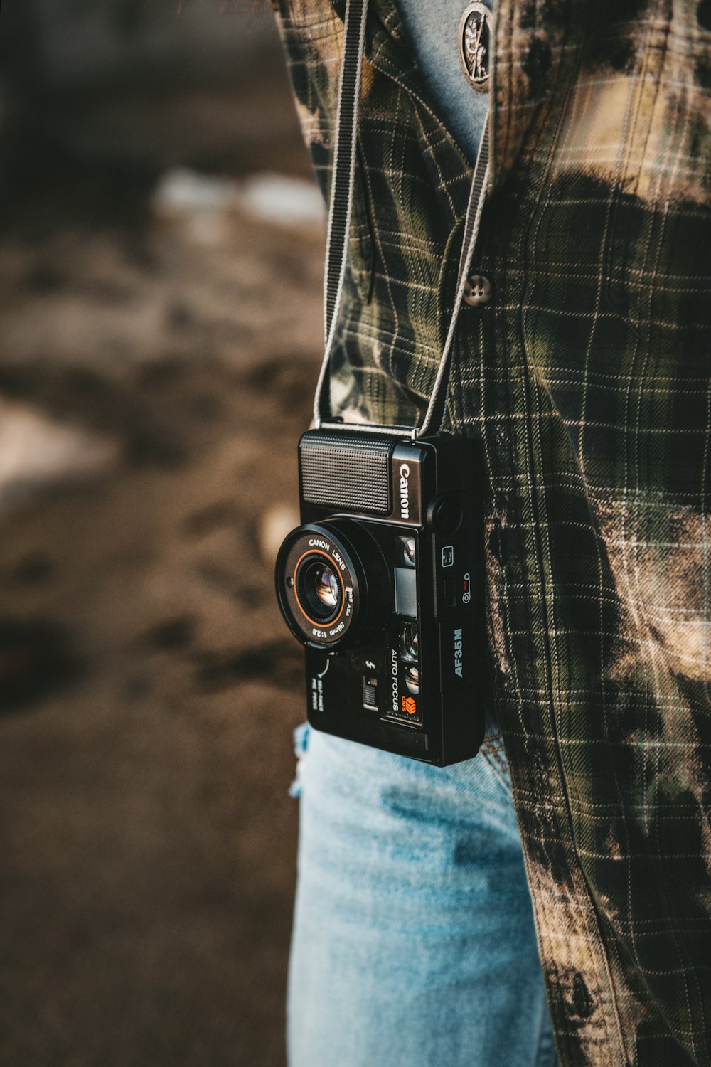 a person holding a camera