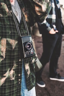 a man holding a camera