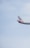 a plane flying in the sky