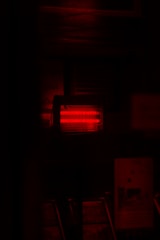 a red light in a dark room