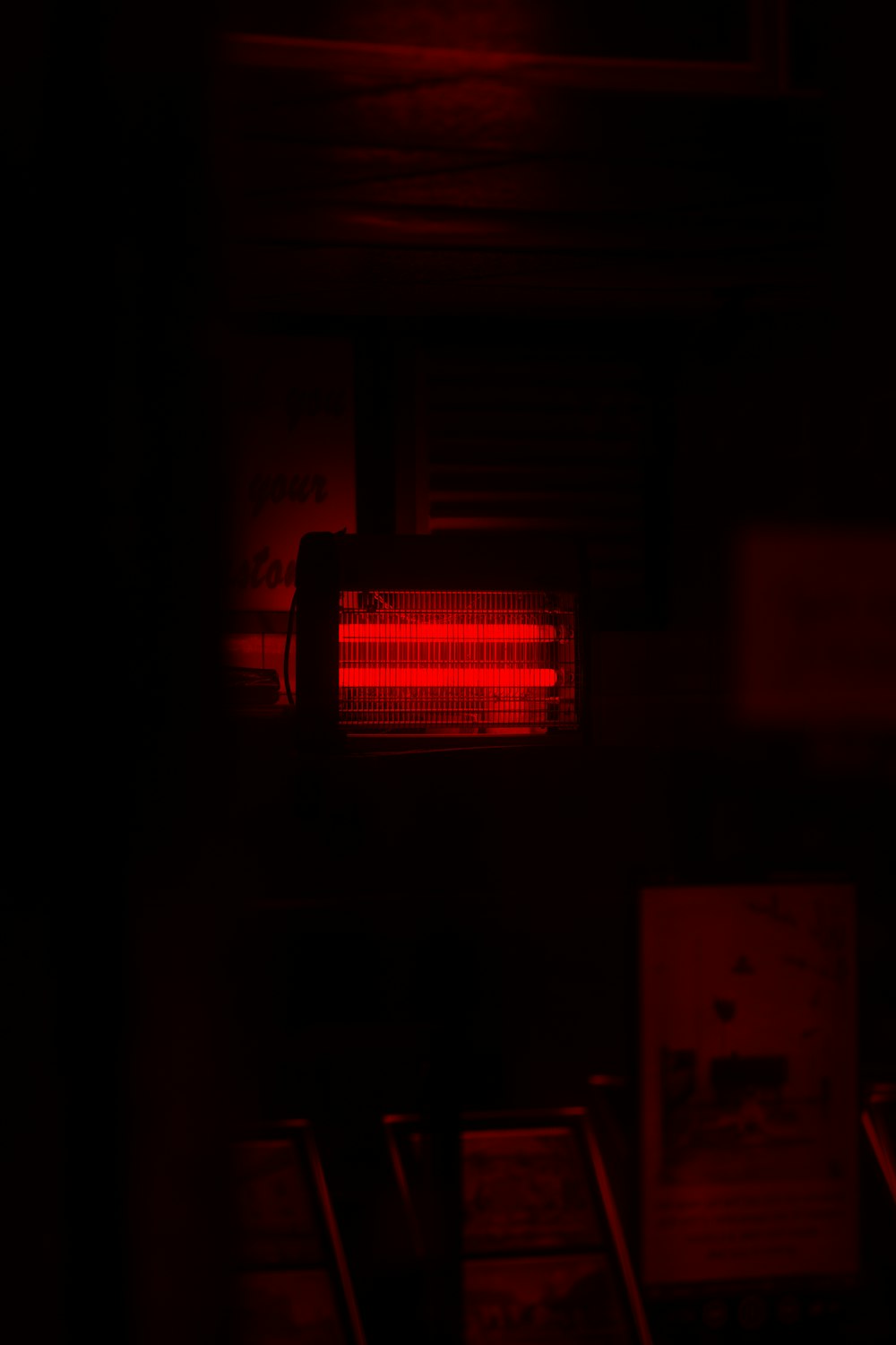 a red light in a dark room