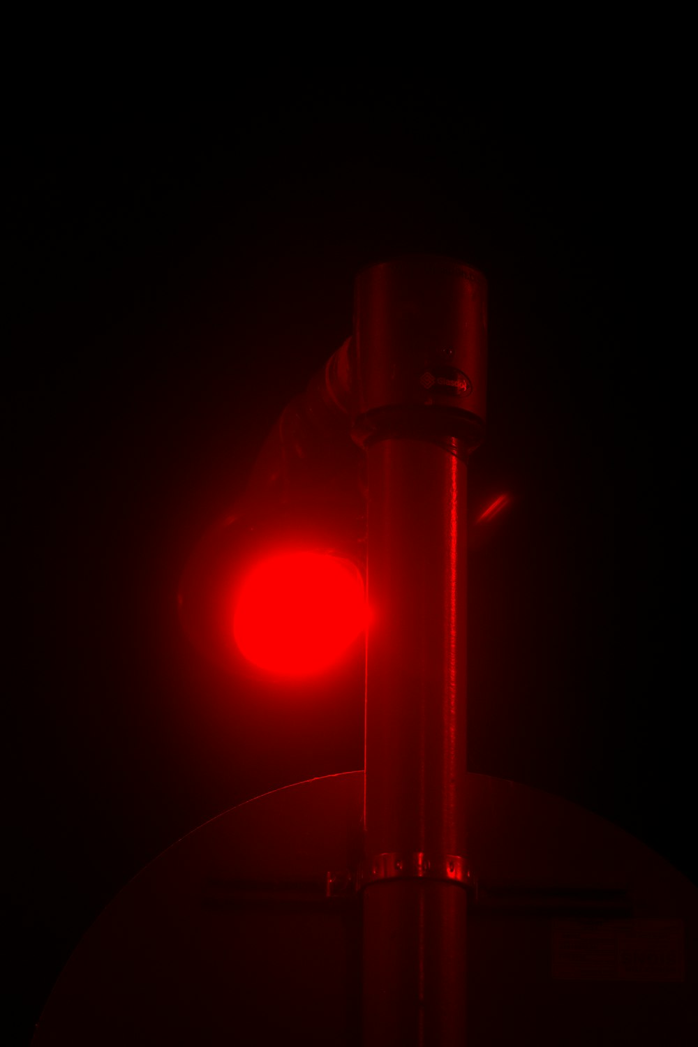 a red light on a pole