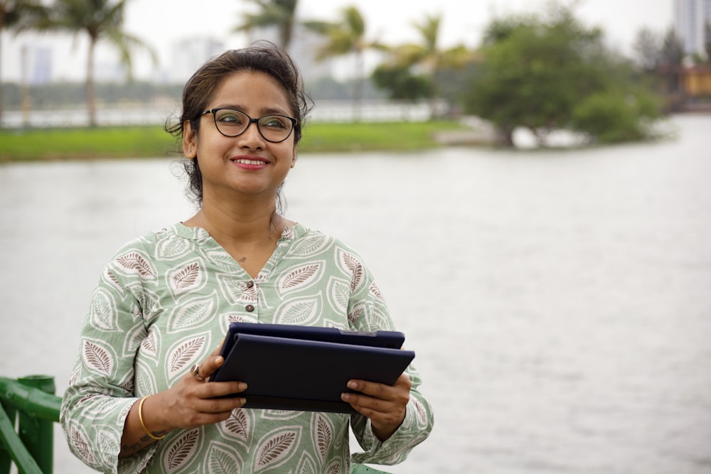 a person holding a tablet