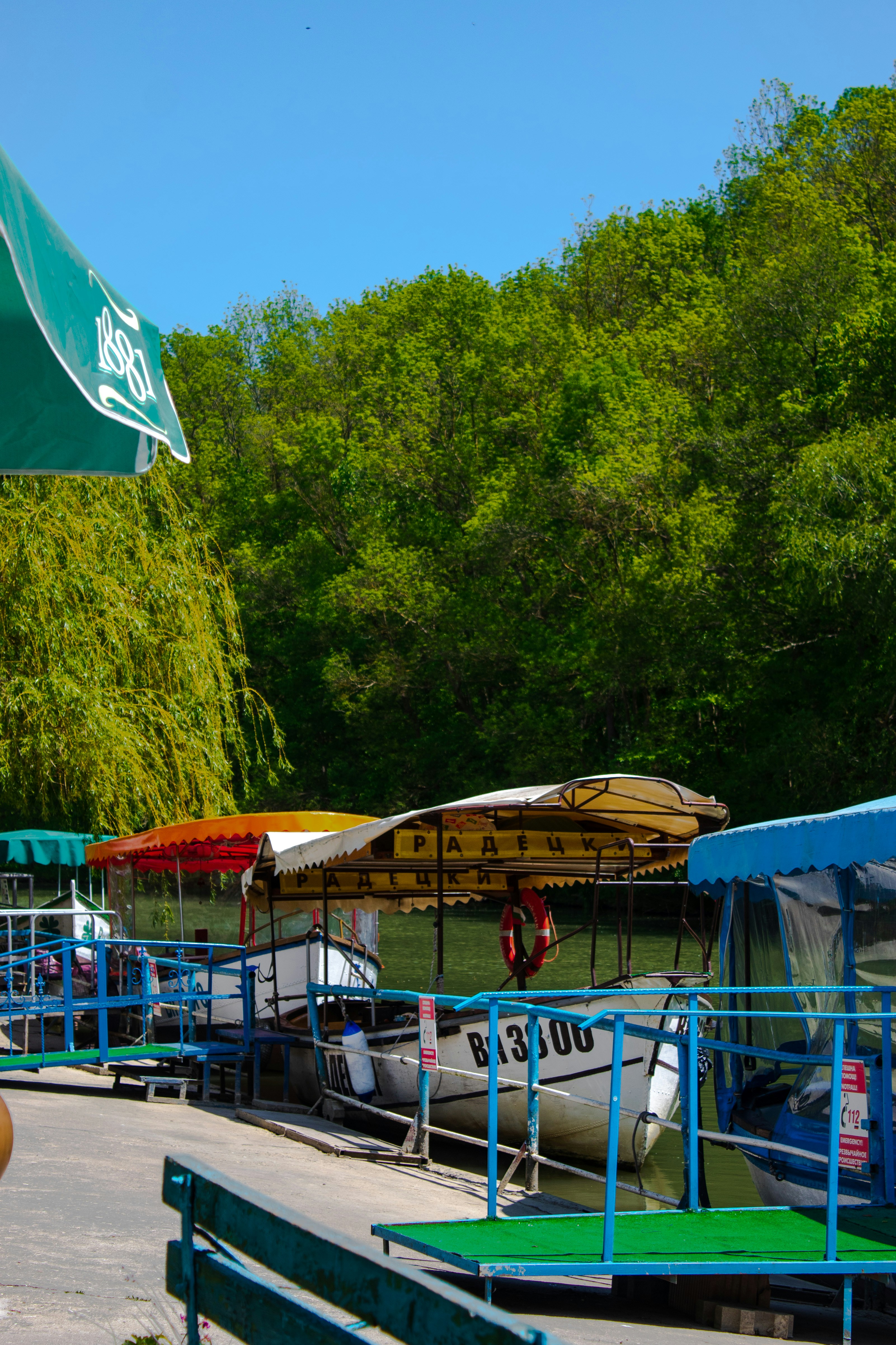 a group of people standing on a boat dock