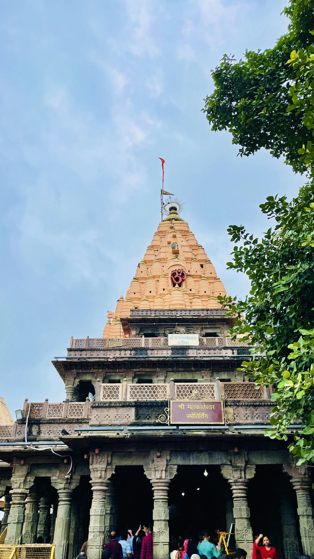 Mahakaleshwar Jyotirlinga temple with its spire against a blue sky in Ujjain