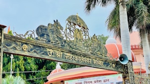 a sign with a statue on it