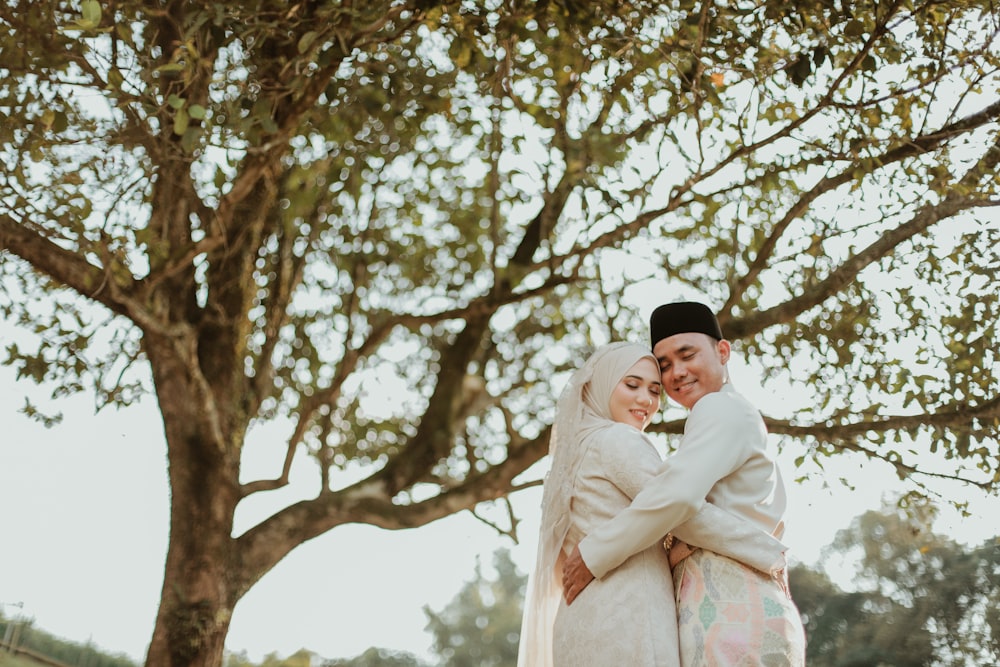 a man and woman in a tree