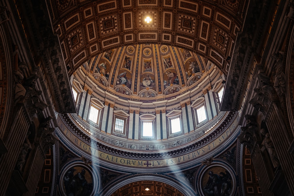 a domed ceiling with a large arched window