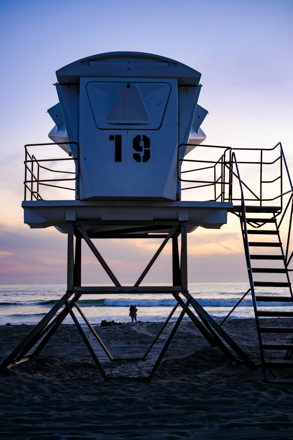 a lifeguard tower on a beach