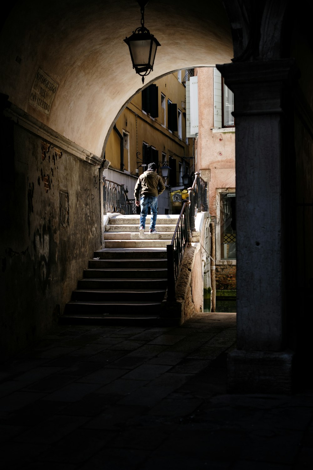 a person walking up a flight of stairs