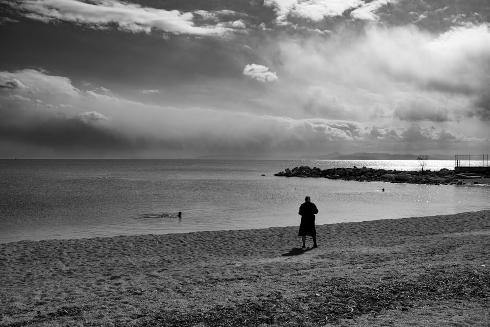 a person standing on a beach