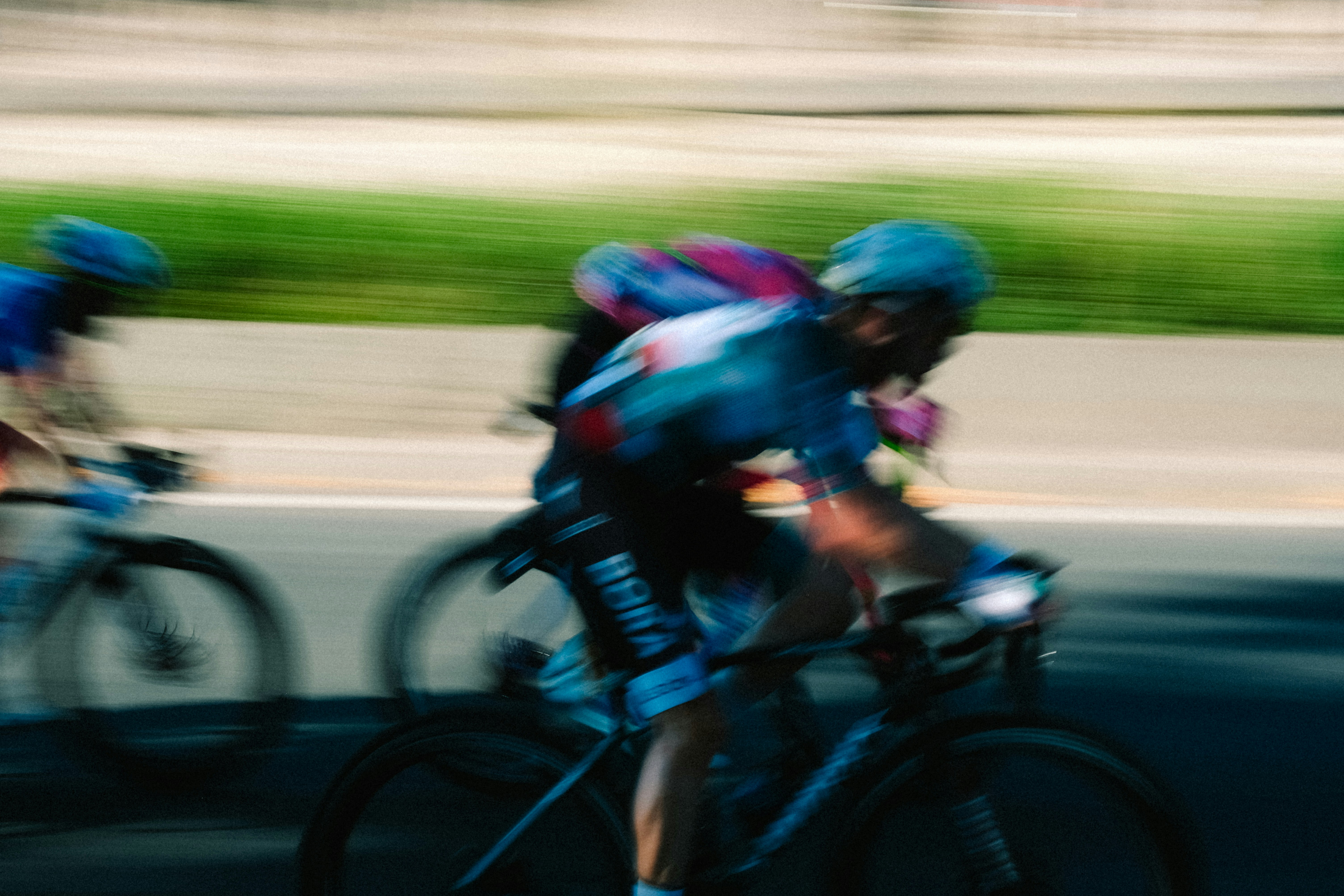 a group of people riding bikes