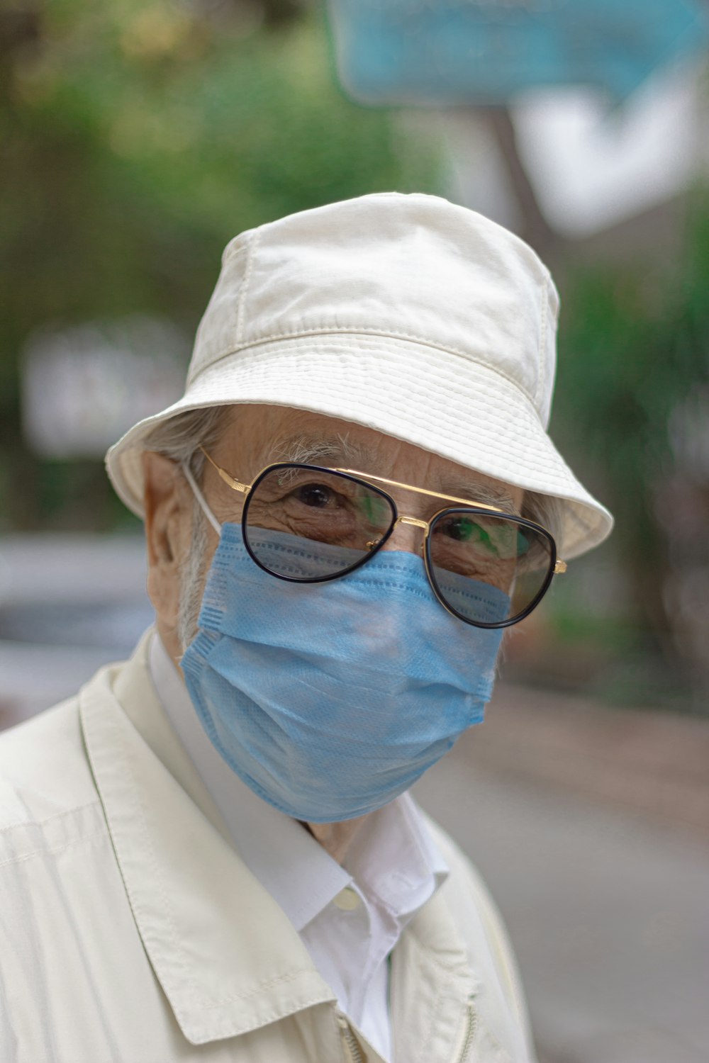a person wearing a mask and a hat