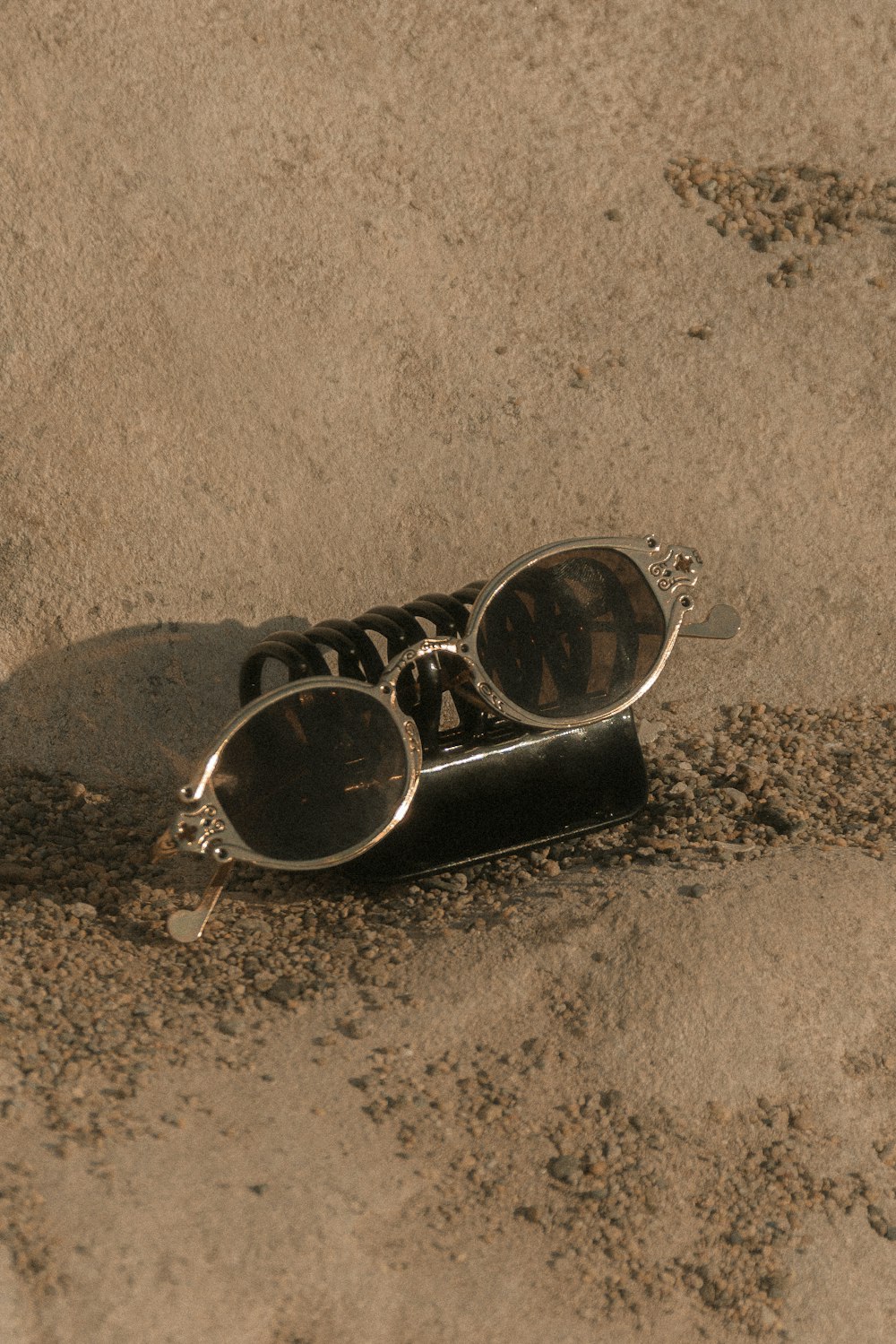 a pair of sunglasses on a carpet