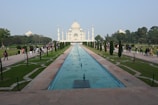 Visitors respectfully walking through the clean and orderly grounds of the memorial garden