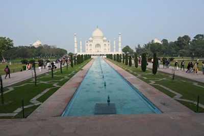 Visitors respectfully walking through the clean and orderly grounds of the memorial garden