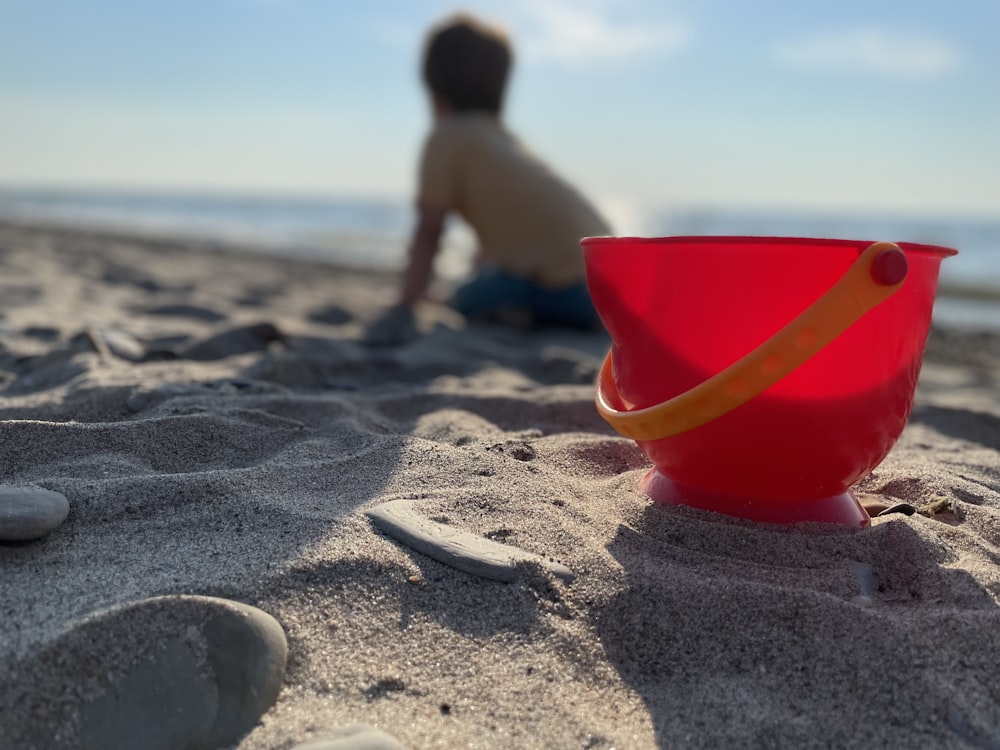 a child playing in the sand