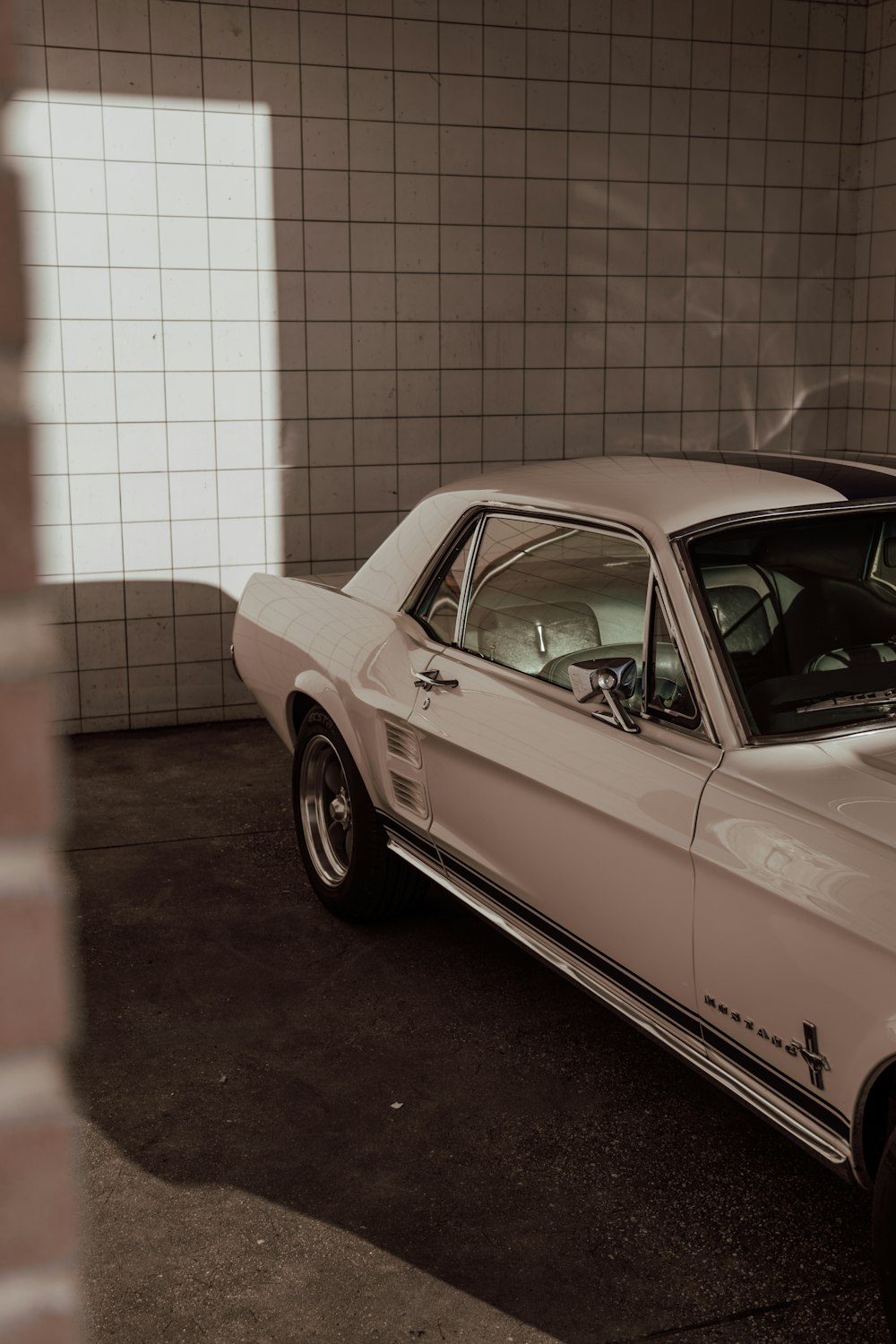 a white car parked in a garage