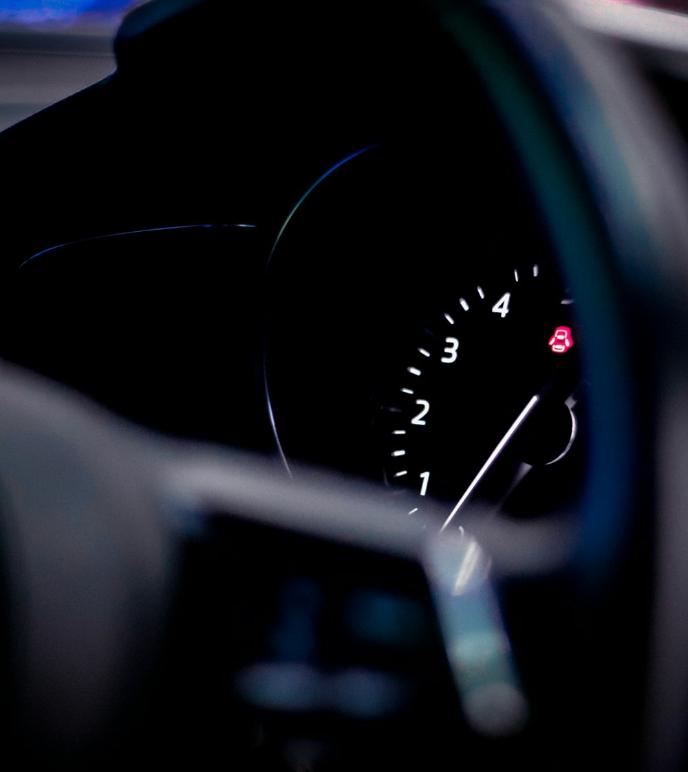 a close up of a car's steering wheel