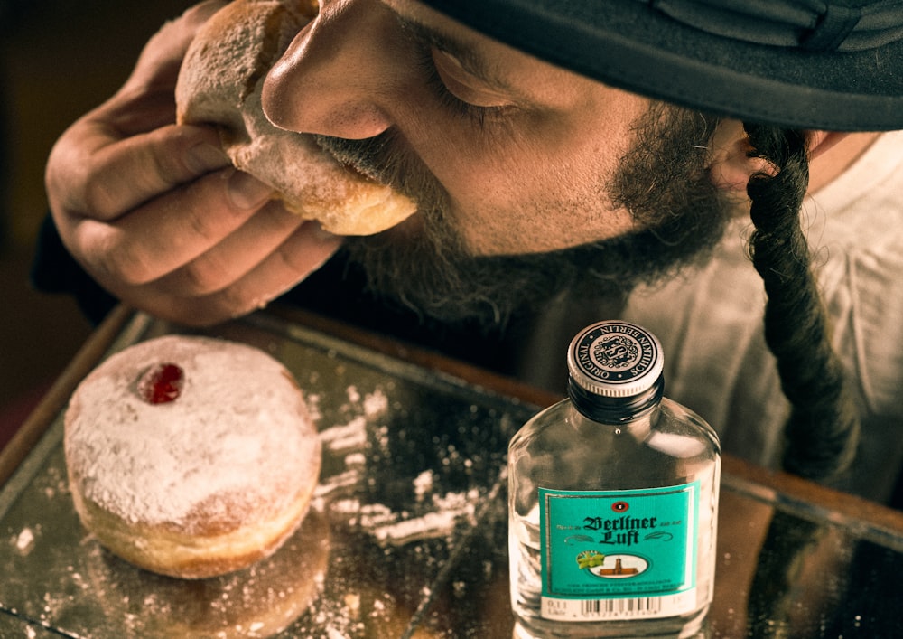 a man eating a donut