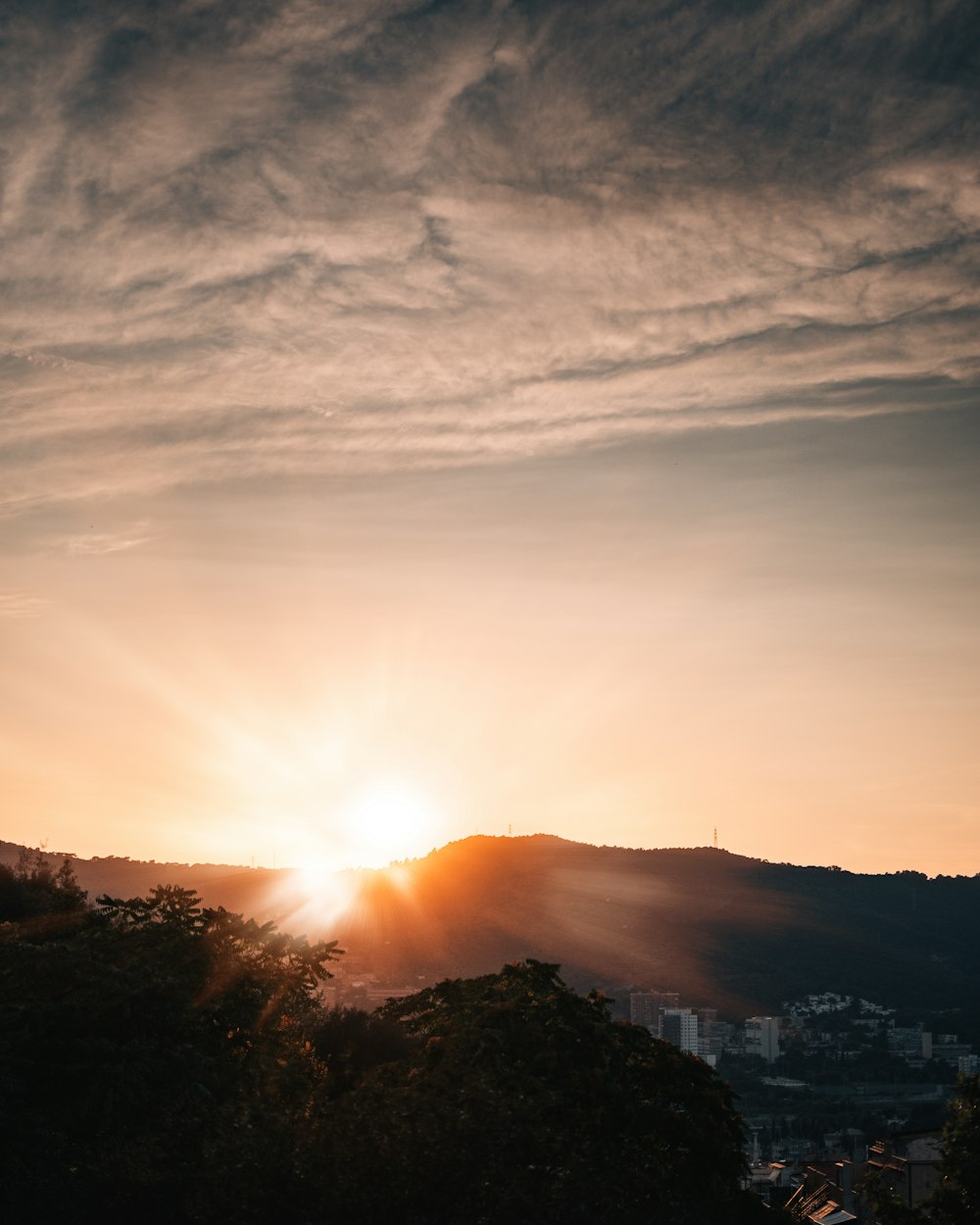 a sunset over a city