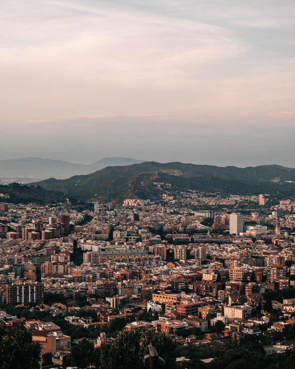 a city with a hill in the background