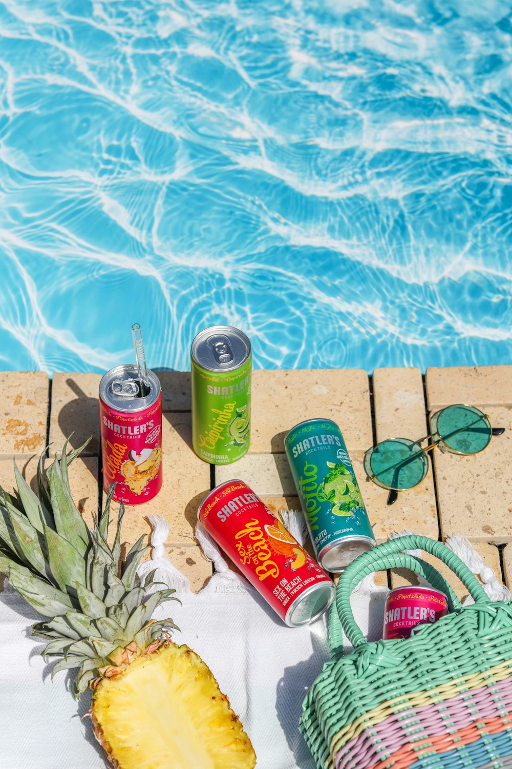 a group of cans and a lemon on a table