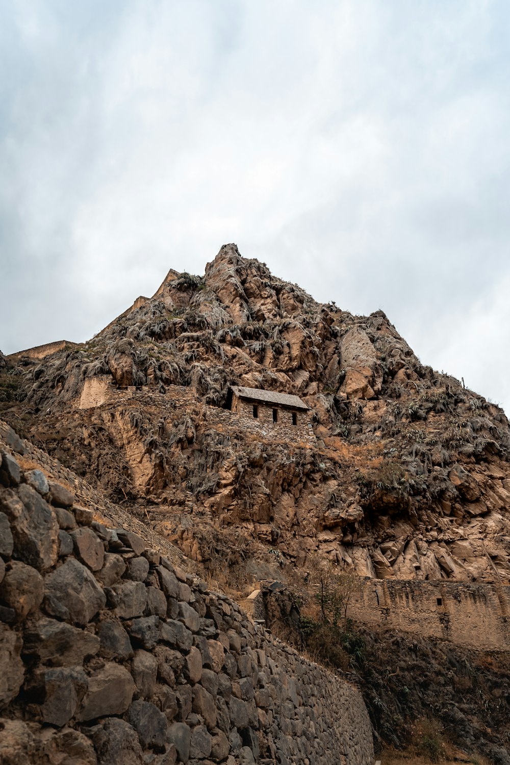 a building on a rocky hill