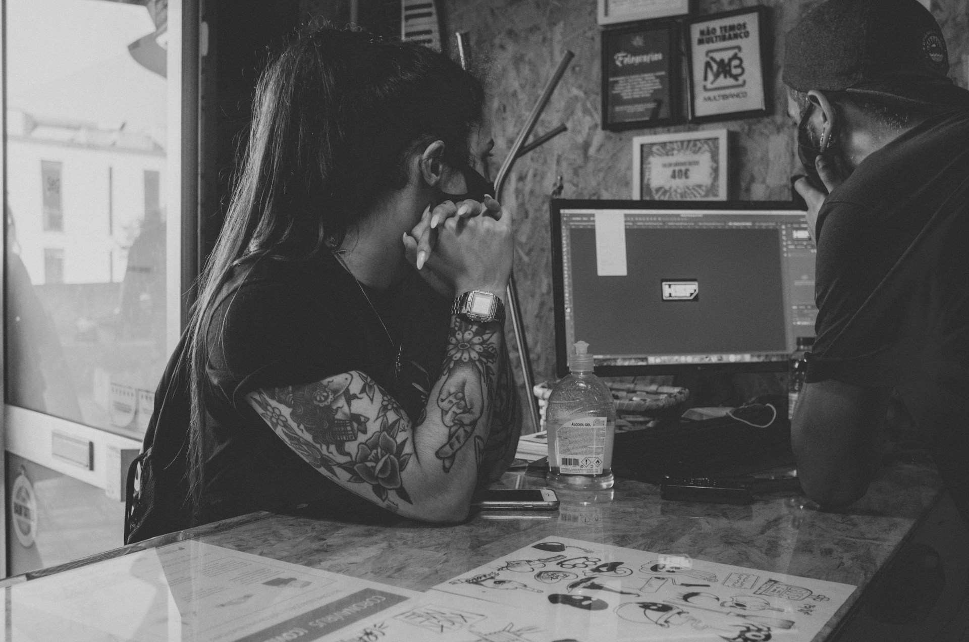 a woman sitting at a desk