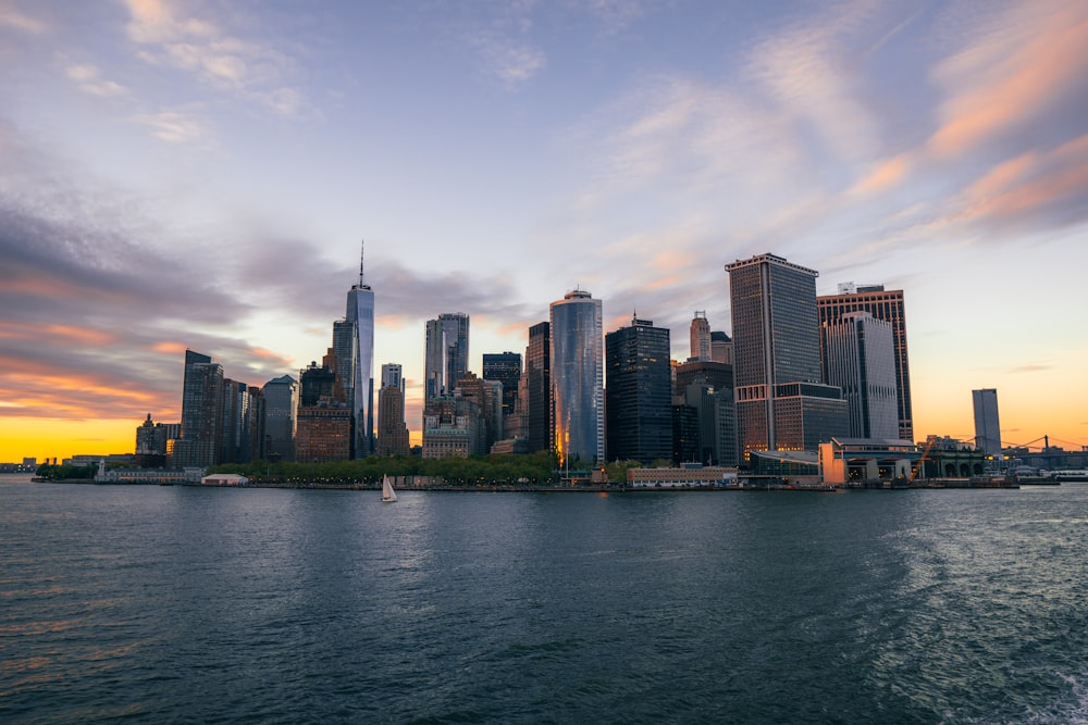 a city skyline by the water