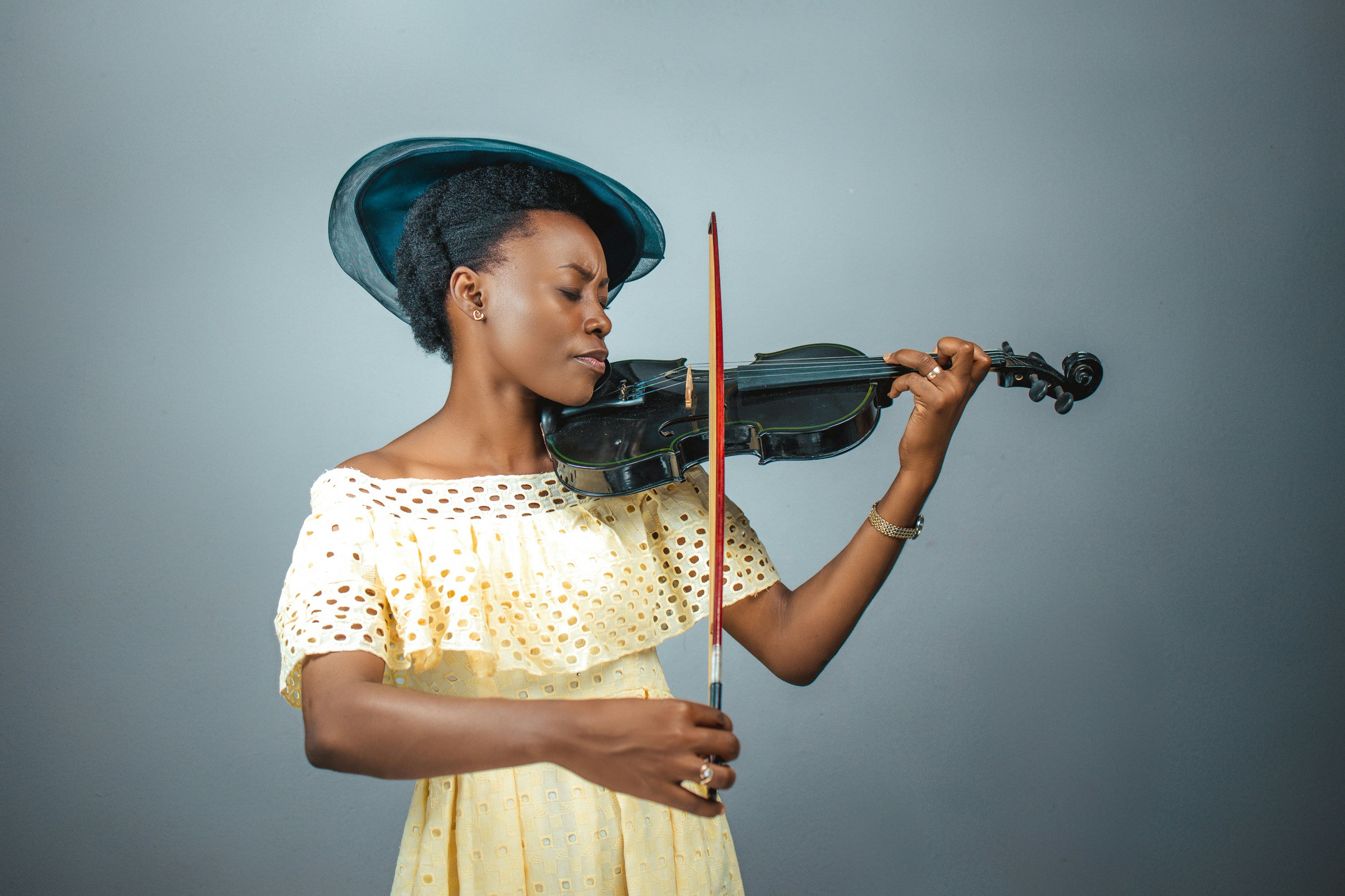 a person playing a violin