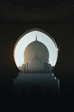 a white building with a domed roof