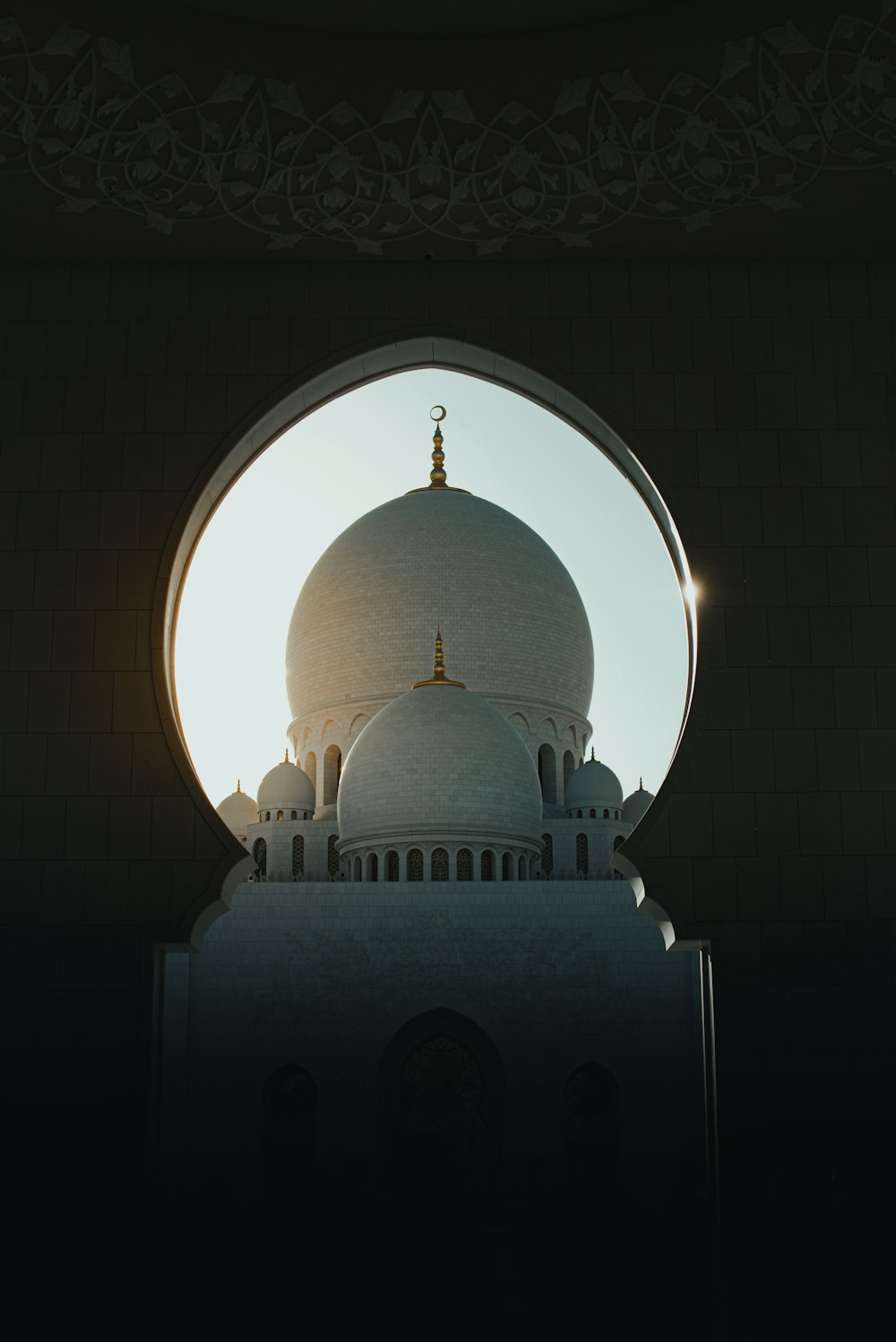 a white building with a domed roof