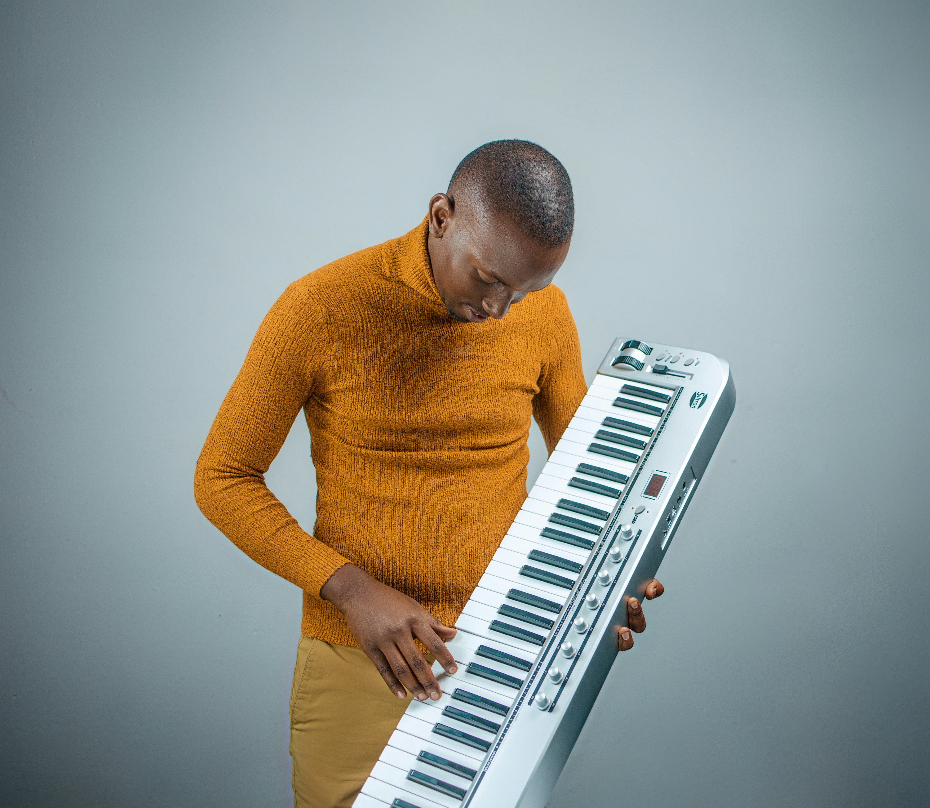 a man playing a piano