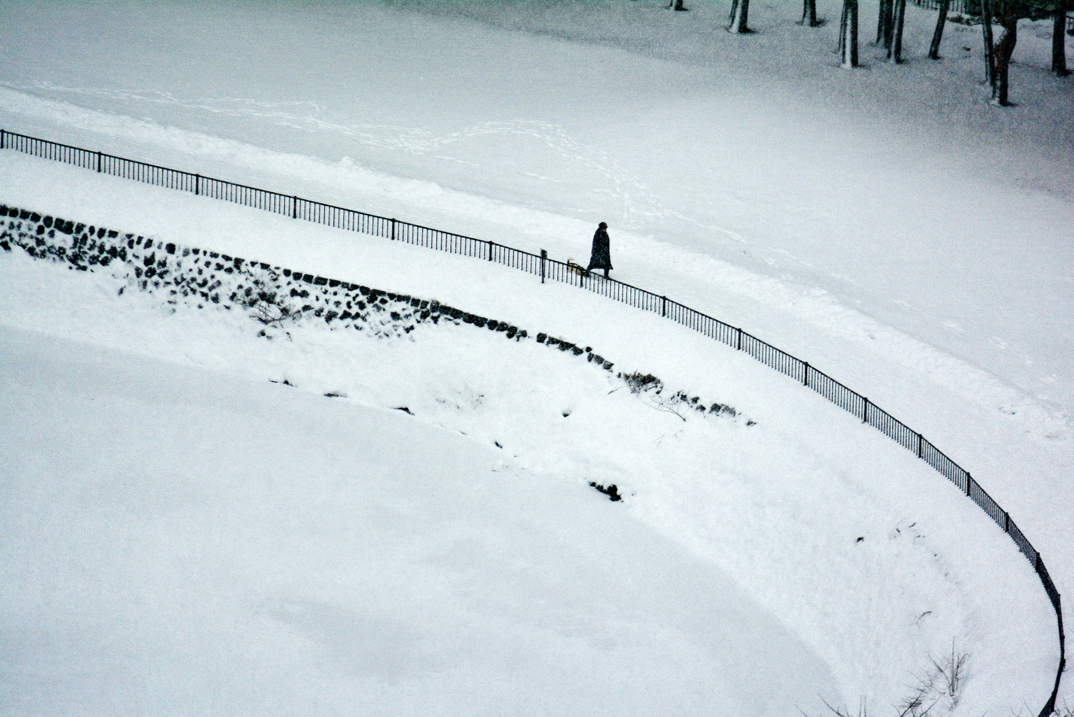 a person walking on a snowy path
