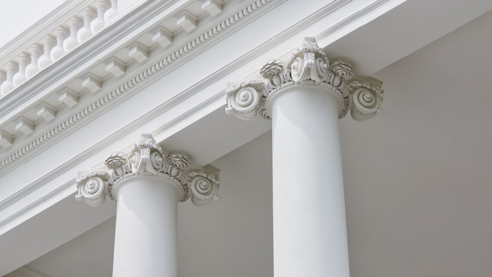 a white ceiling with a column