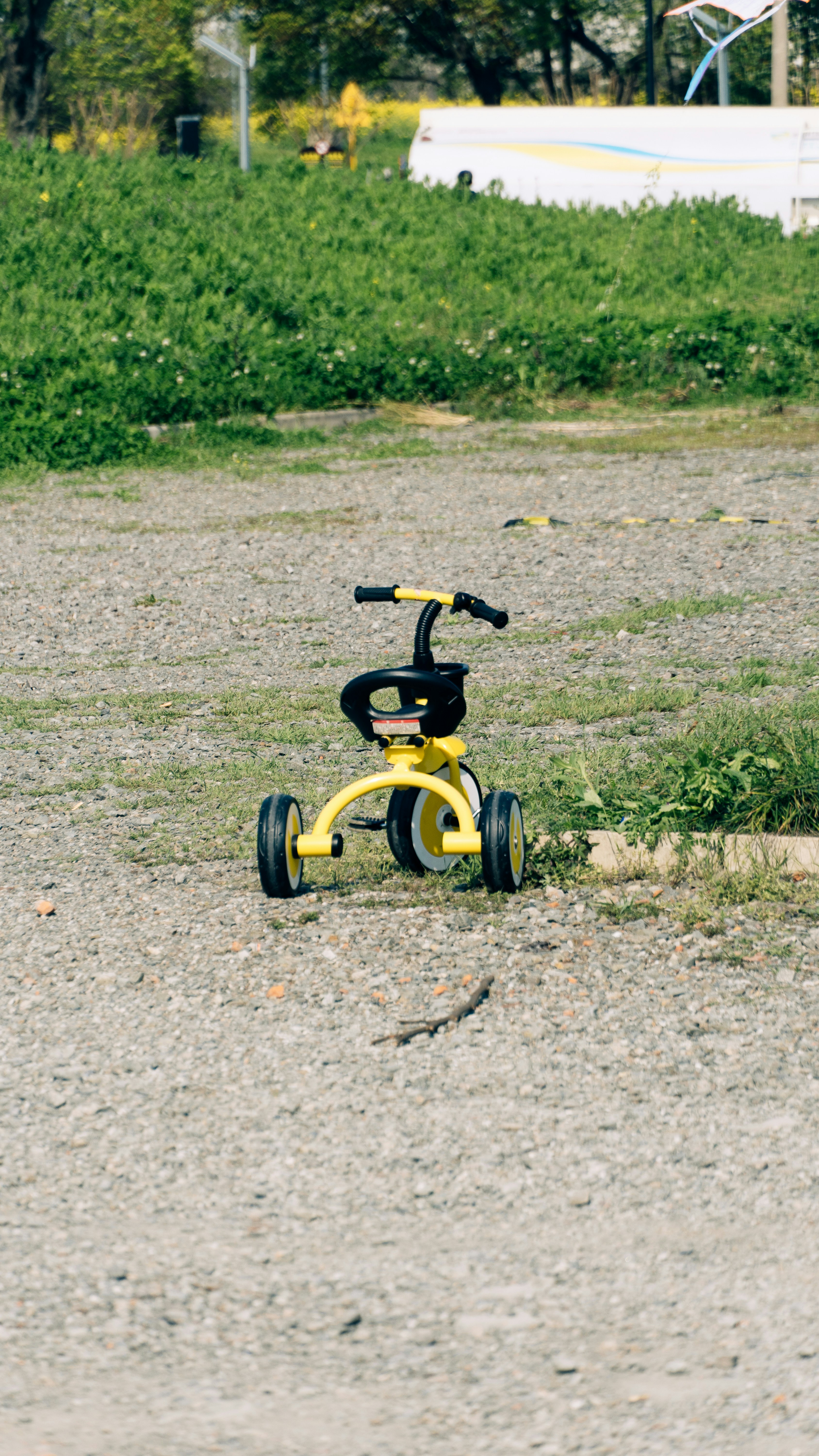 a small yellow and black toy vehicle