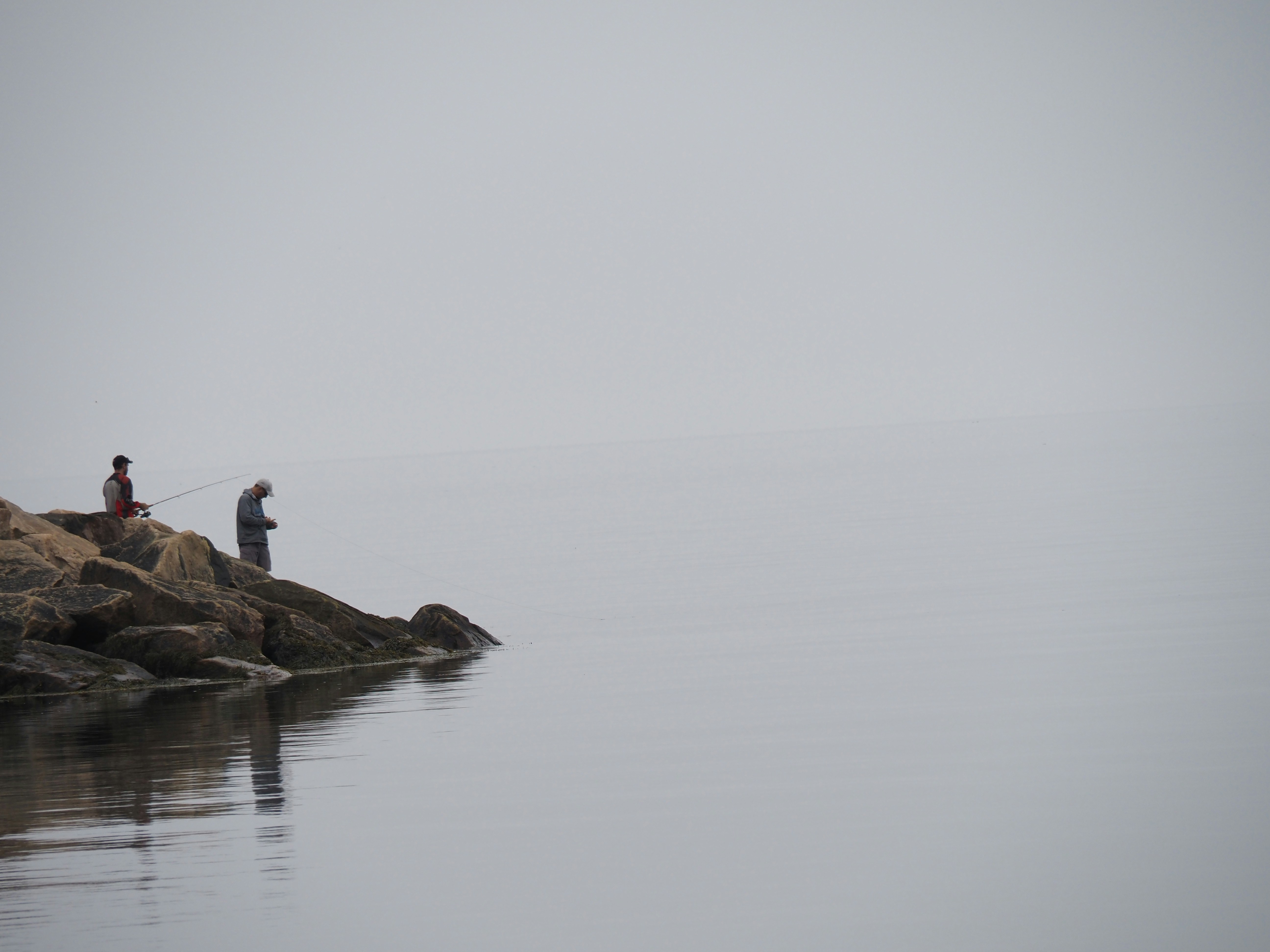 a few people fishing