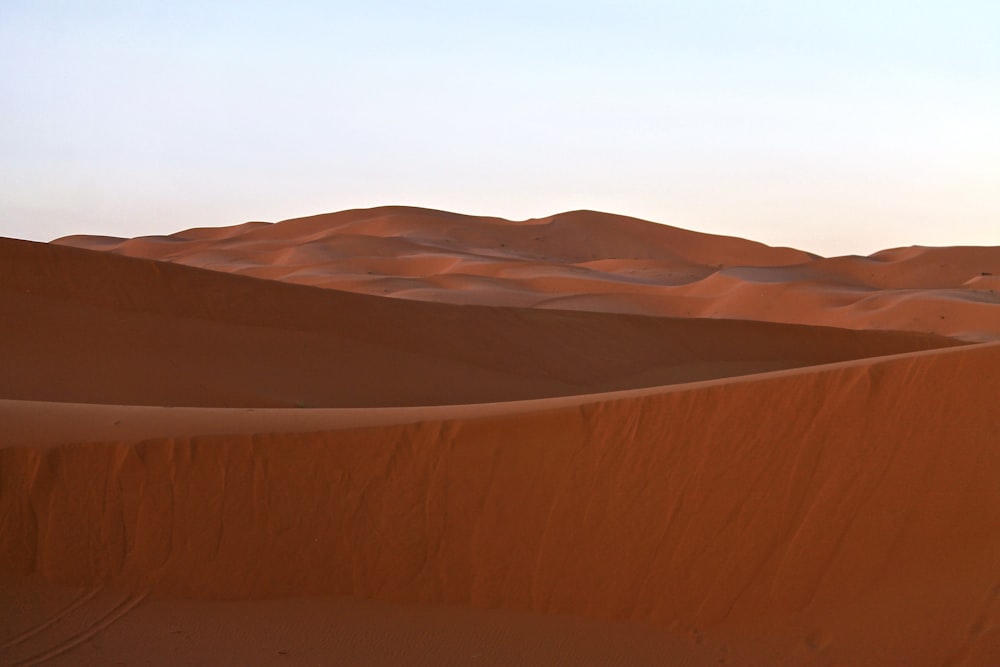 a man riding on top of a mountain