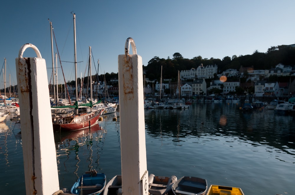 a boat is docked next to a body of water