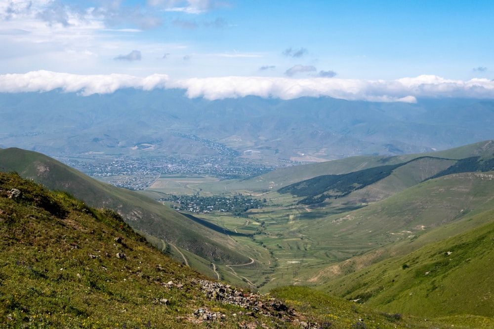 a valley with a river running through it