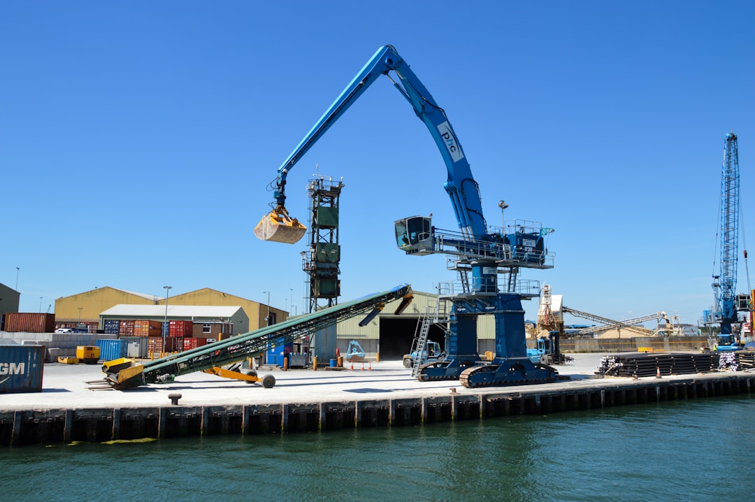 Dockside cranes unloading cargo