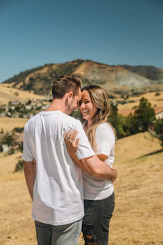 a man and woman kissing