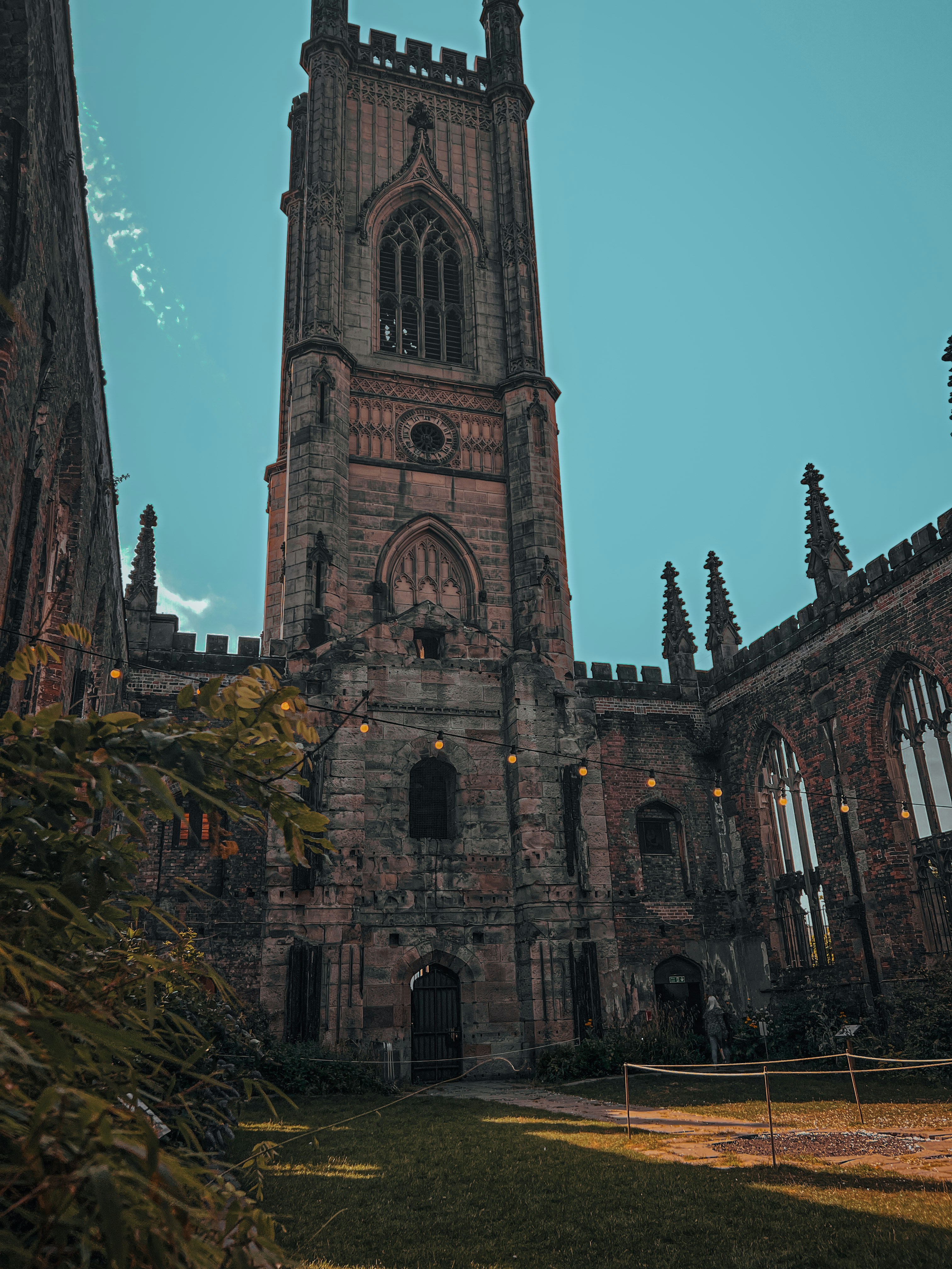 a large stone building with a clock tower