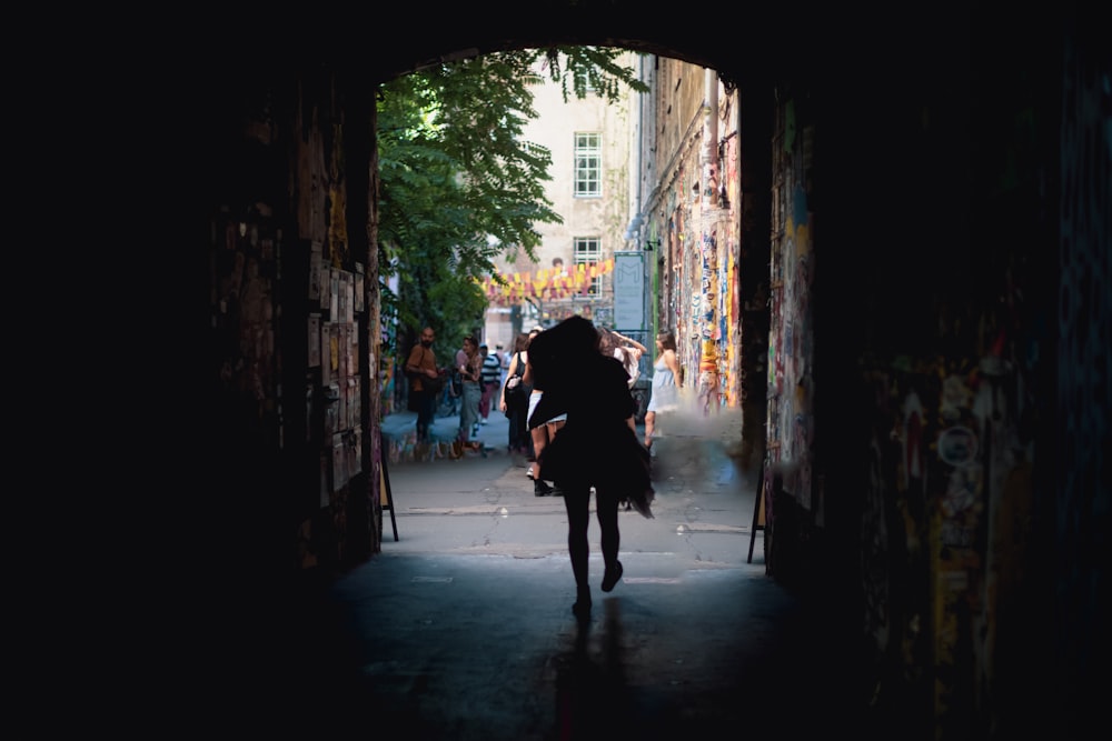 a person walking down a sidewalk