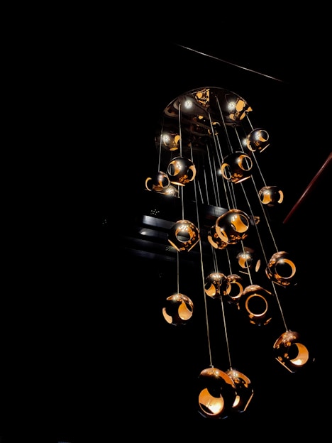Chandelier lighting fixture in a cozy living room setting